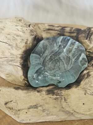 Drijfhout met enkele waxine