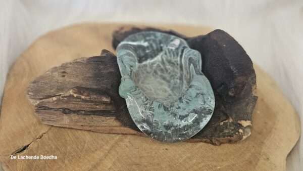 Drijfhout met enkele waxine